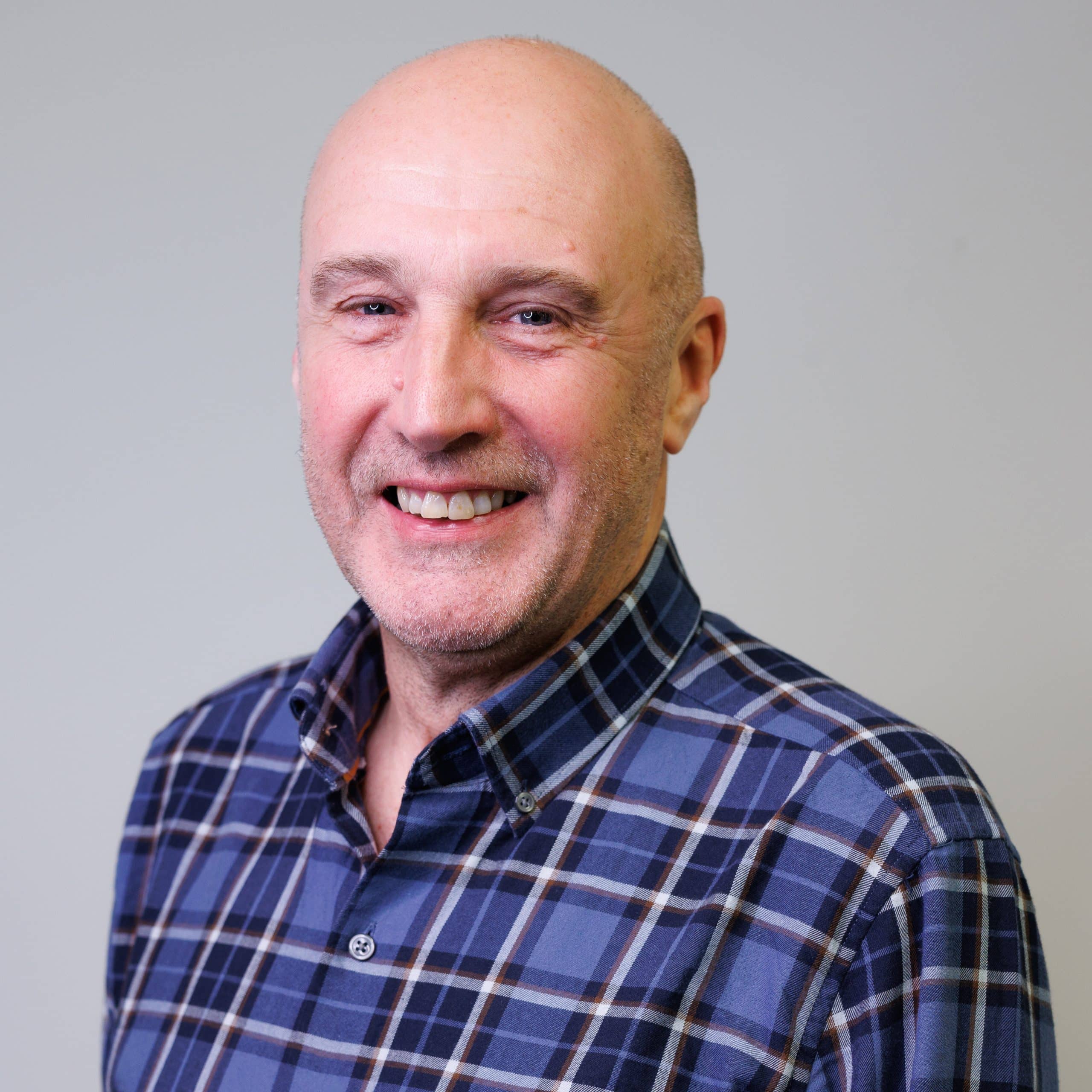 A head and shoulders profile photo.