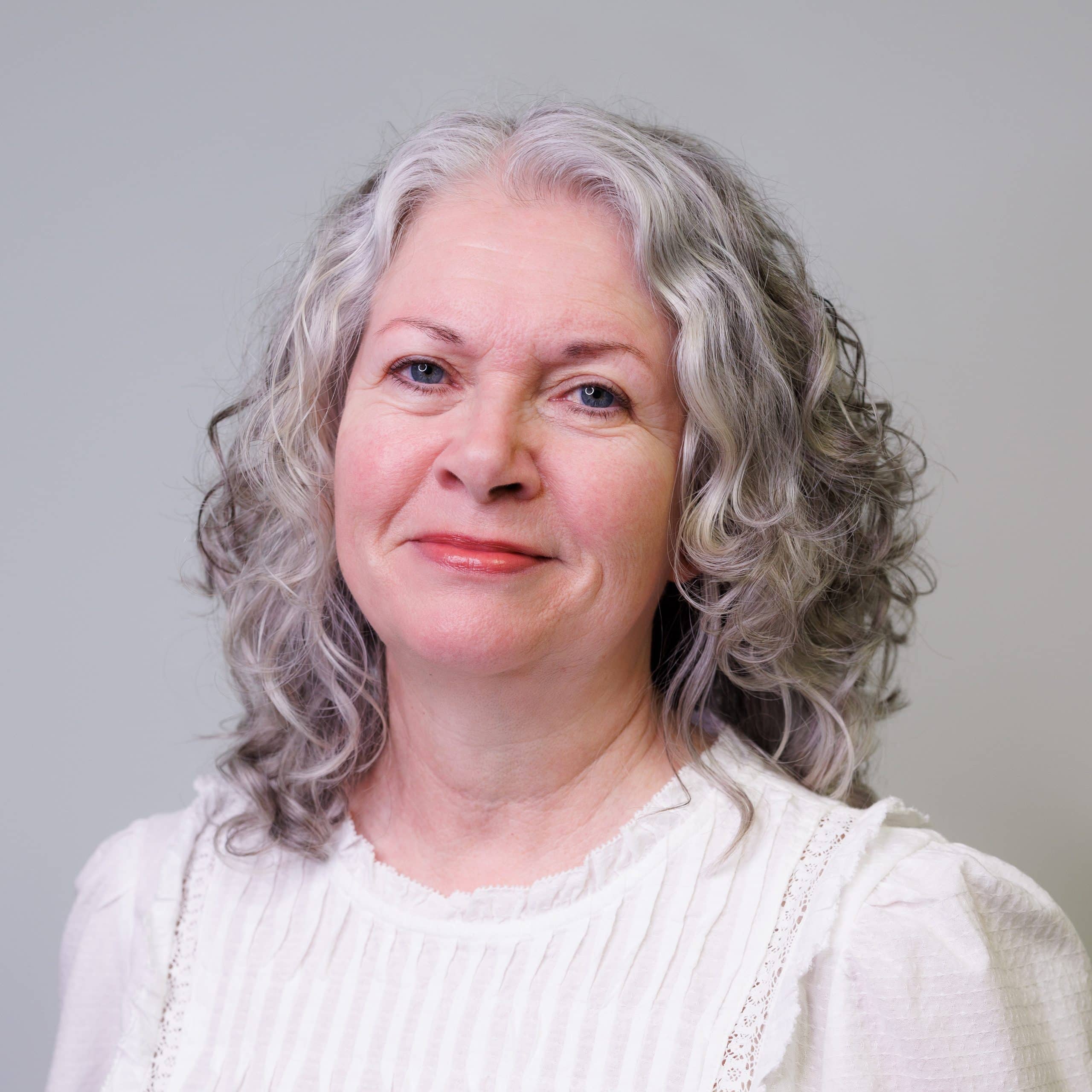 A head and shoulders profile photo.