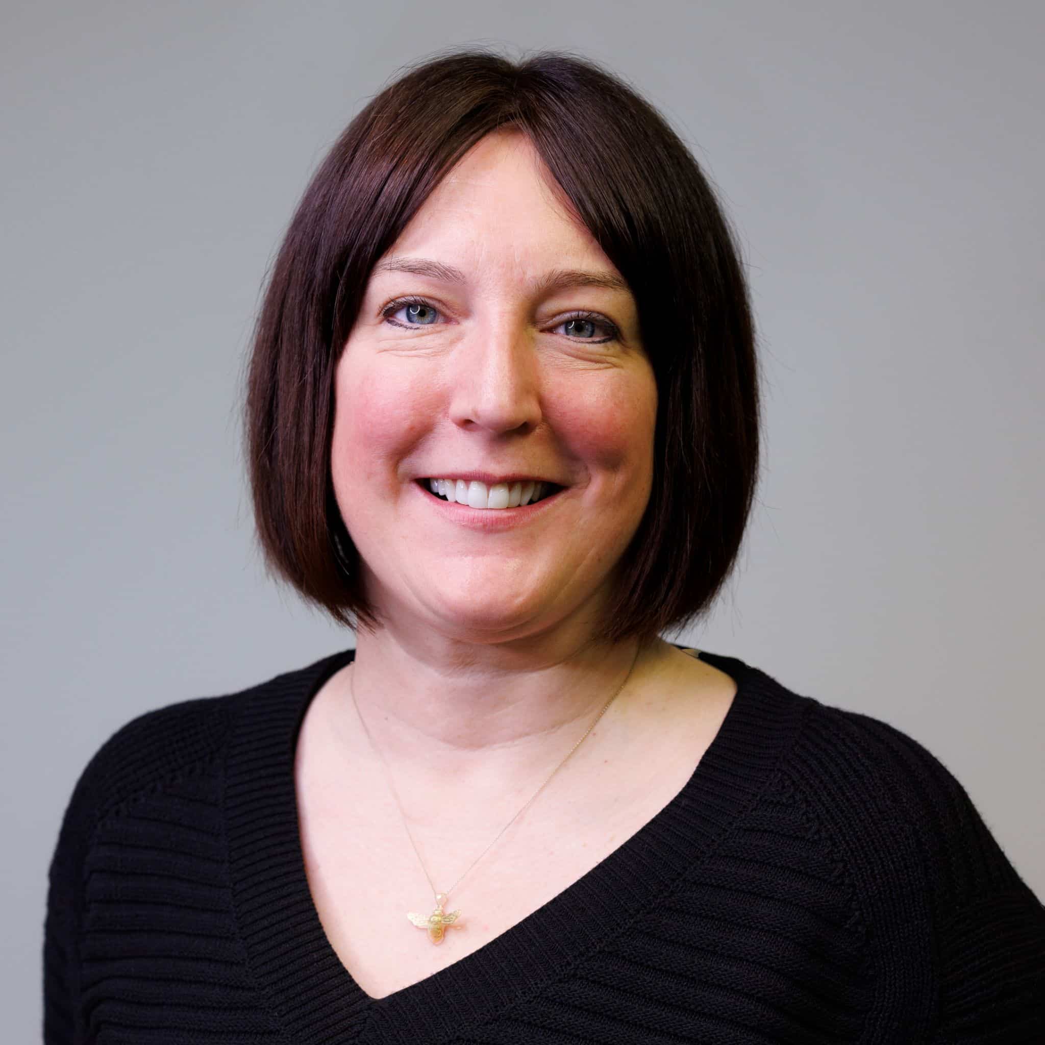 A head and shoulders profile photo.