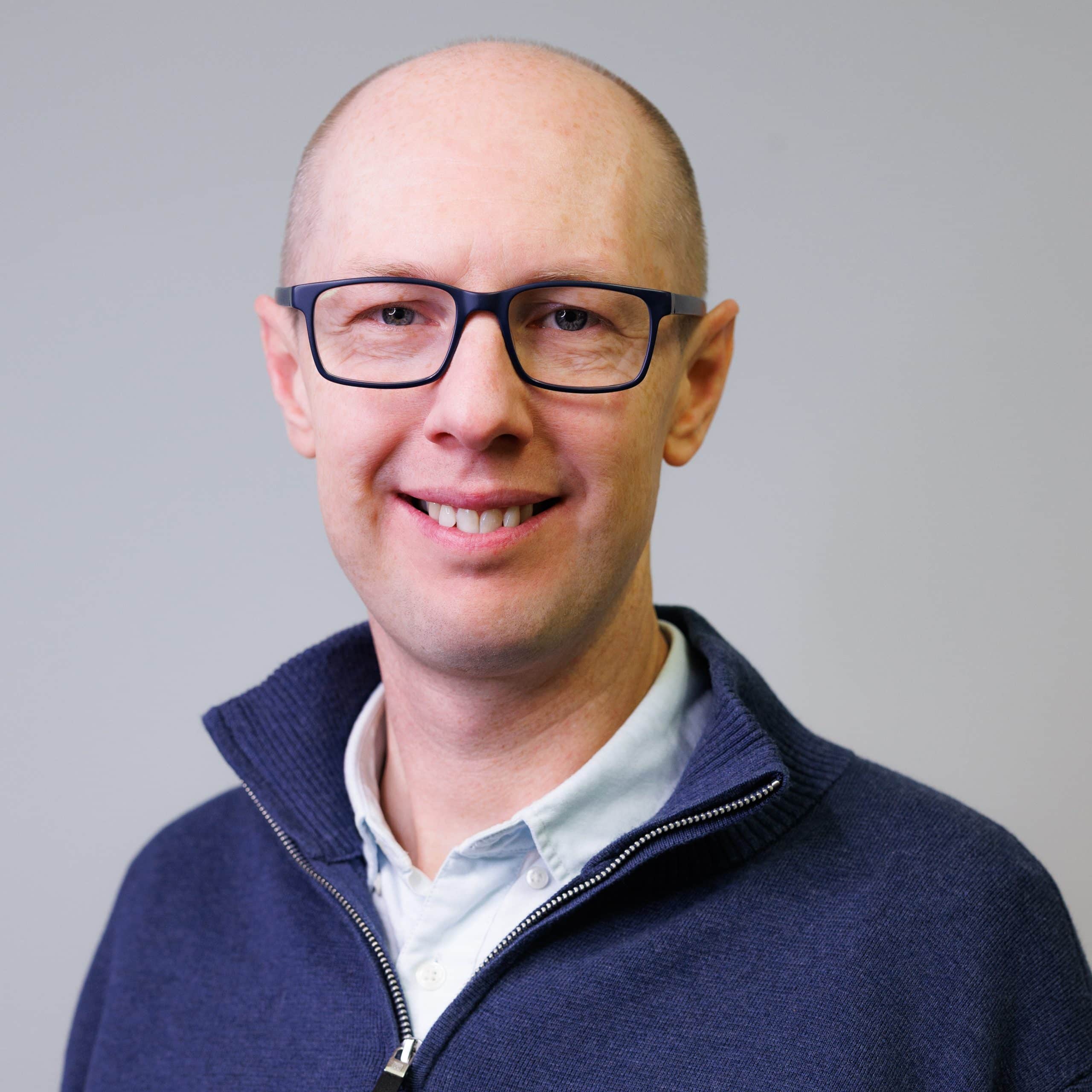 A head and shoulders profile photo.