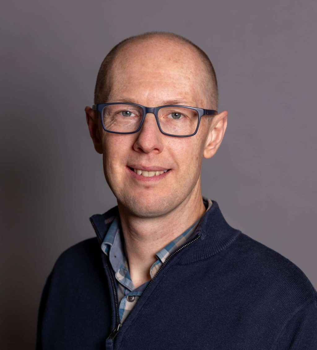 A head and shoulders profile photo.