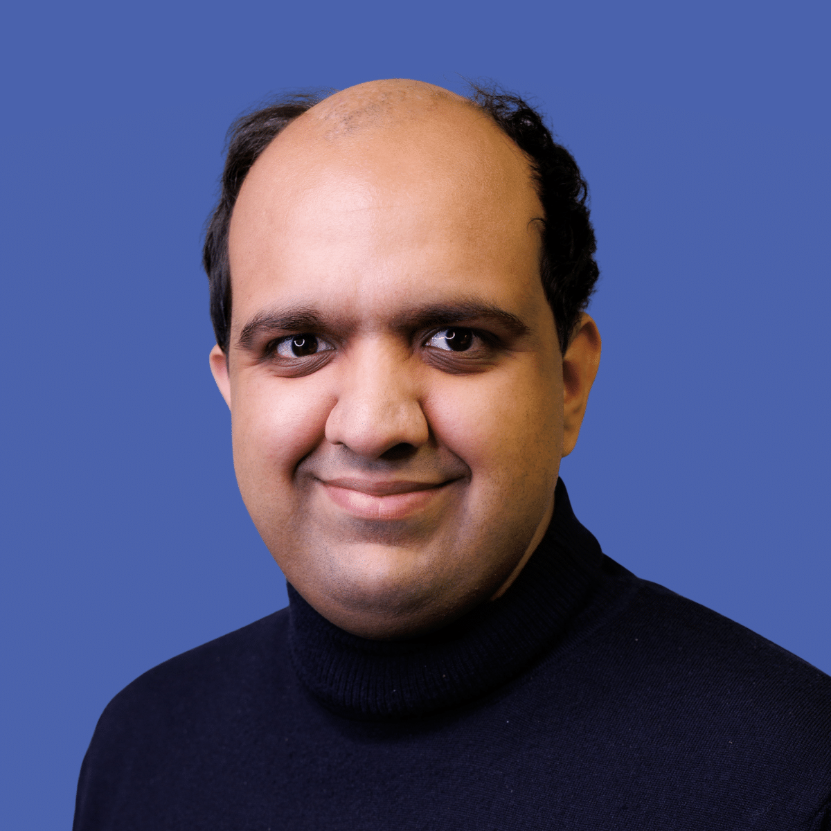 A head and shoulders profile photo.