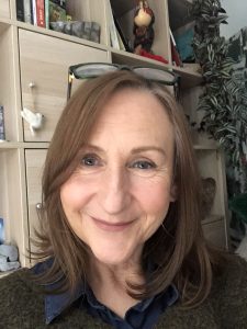 A head and shoulders profile photo.