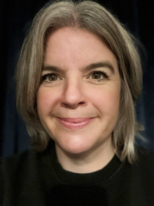 A head and shoulders profile photo.